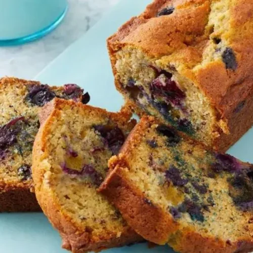 This heavenly creation combines the classic comfort of moist banana bread with a delightful burst of juicy blueberries in every bite.