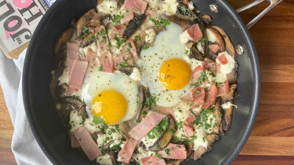 Baked eggs, mushroom, ham and mozzarella pan