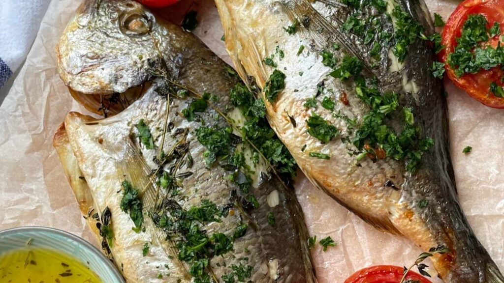 Whole baked sea bream with thyme, lemon and garlic