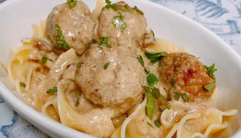 These tender meatballs, made with a delightful combination of ground beef and aromatic spices, are cooked to perfection in the Instant Pot, ensuring a quick and convenient meal.