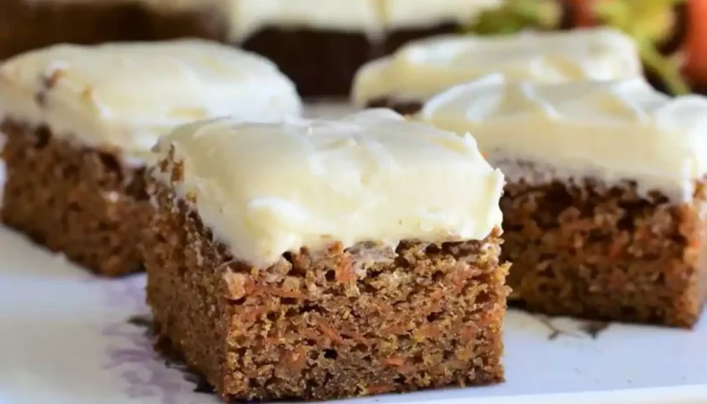 These moist and heavenly bars are made with freshly grated carrots, warm spices, and a hint of sweetness.