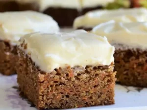 These moist and heavenly bars are made with freshly grated carrots, warm spices, and a hint of sweetness.