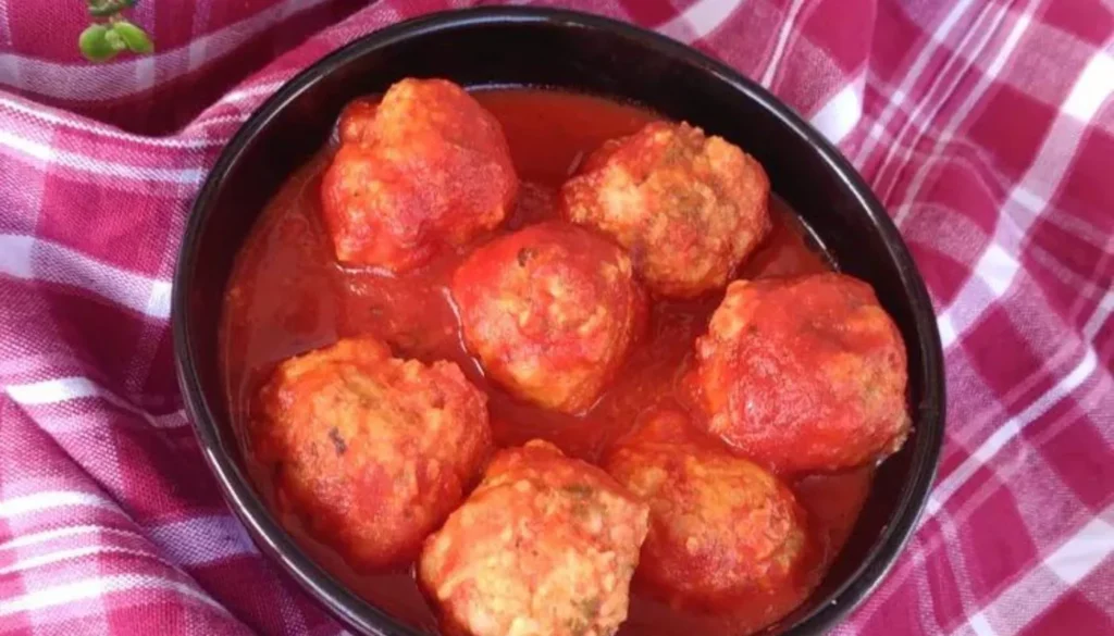 Made with tender, flavorful chicken, these meatballs are slow-cooked to perfection, resulting in a juicy and savory dish.