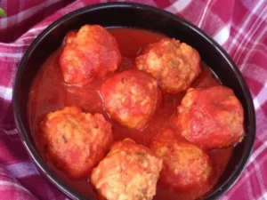 Made with tender, flavorful chicken, these meatballs are slow-cooked to perfection, resulting in a juicy and savory dish.