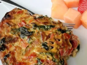 Packed with an array of fresh seasonal vegetables, this gluten-free and low-carb delight is perfect for breakfast or brunch. With each bite, savor the harmonious blend of tender veggies, creamy cheese, and savory herbs.