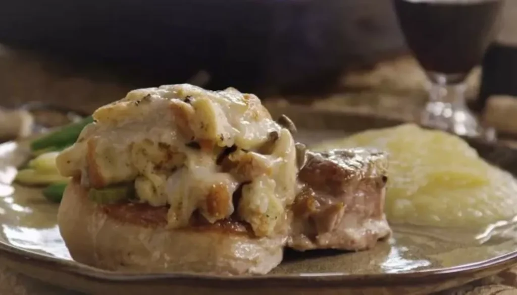 This mouthwatering recipe features tender pork chops filled with a savory mixture, then baked to perfection.