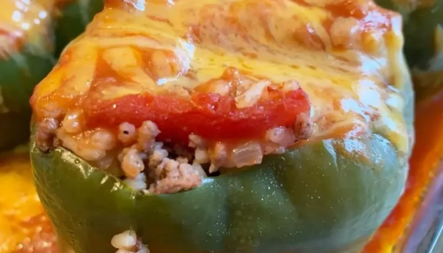 Tender green peppers are generously filled with a savory blend of seasoned ground meat, rice, and aromatic herbs, creating a symphony of flavors in every bite. Baked to perfection, these stuffed peppers are the epitome of comfort food.