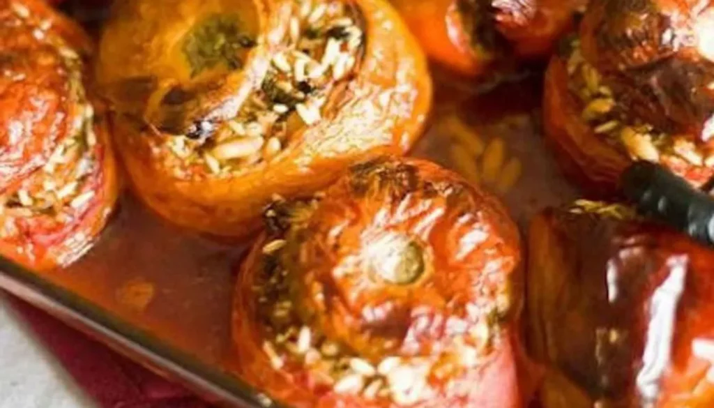 These vibrant and flavorful vegetables are generously filled with a mouthwatering mixture of aromatic herbs, rice, and ground beef.