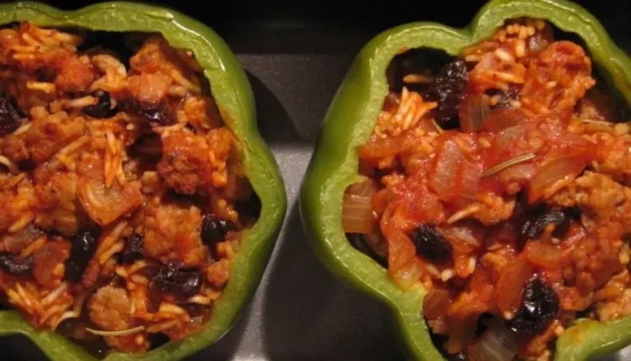 This classic recipe combines vibrant bell peppers, stuffed with a savory mixture of aromatic herbs and spices.