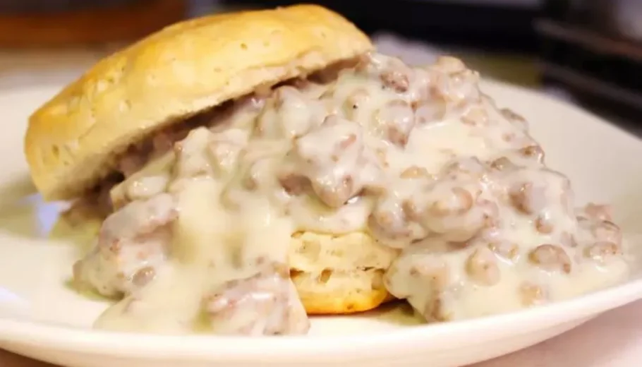 This hearty dish features perfectly flaky biscuits smothered in a savory sausage gravy that will leave you craving for more.
