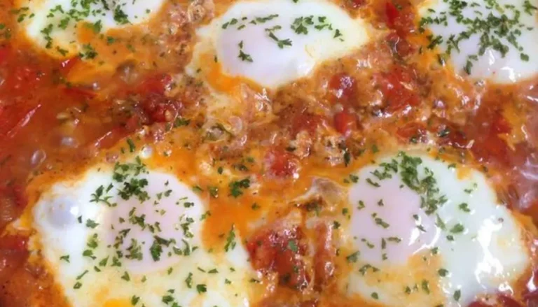 This easy-to-make recipe combines perfectly poached eggs with a rich tomato sauce, infused with aromatic spices.