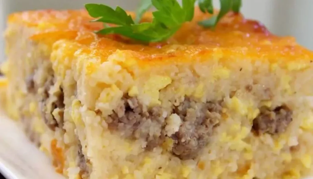 This mouthwatering dish combines savory sausage, creamy cheese, and perfectly cooked grits, all baked to golden perfection.
