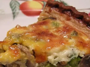 This savory delight combines earthy mushrooms, crisp asparagus, and a rich blend of cheeses, all nestled in a flaky crust.