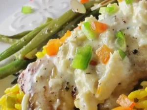 Elevate your seafood dining experience with our delectable recipe for Broiled Grouper with Creamy Crab and Shrimp Sauce. Indulge in perfectly broiled grouper fillets, adorned with a luxurious creamy sauce featuring succulent crab and shrimp.