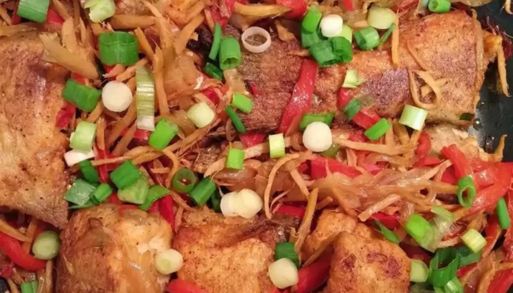 This Asian-inspired dish features tender catfish infused with aromatic ginger and a delightful blend of Cambodian spices.