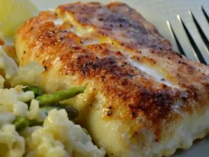 Enjoy tender, flaky haddock with a crispy crust, enhanced with hints of lemon, herbs, and garlic. Gluten-free, low-carb, and keto-friendly, it's a flavorful option that's both nutritious and delicious.