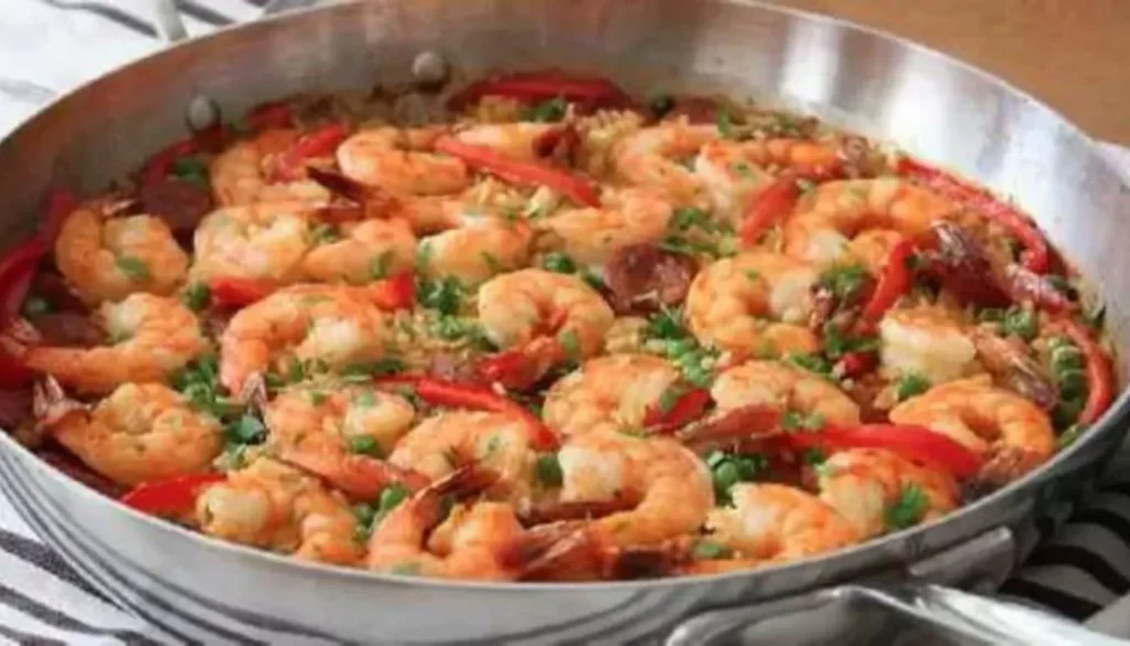 With its vibrant colors and aromatic blend of spices, our Spanish Paella will transport you to the sunny streets of Valencia.