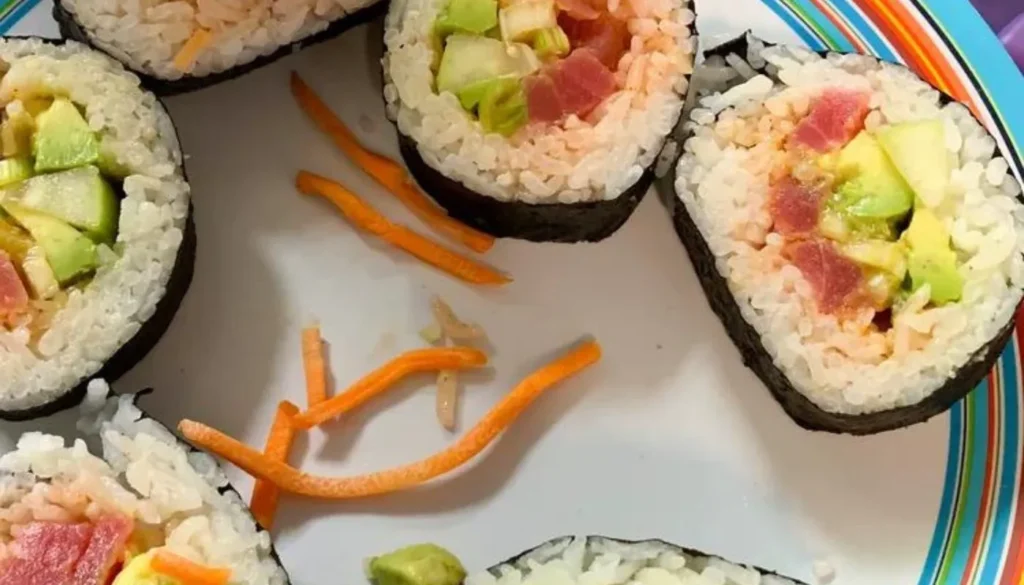 This delectable sushi roll features a tantalizing combination of fresh tuna, perfectly balanced spices, and a satisfying crunch.