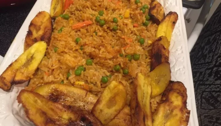 Flavorful Nigerian Jollof Rice with Chicken and Fried Crispy Plantains
