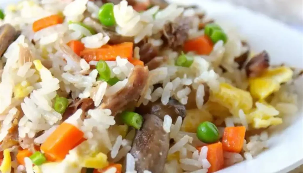 With tender pieces of juicy pork, perfectly cooked rice, and a medley of colorful vegetables, this dish is a surefire crowd-pleaser