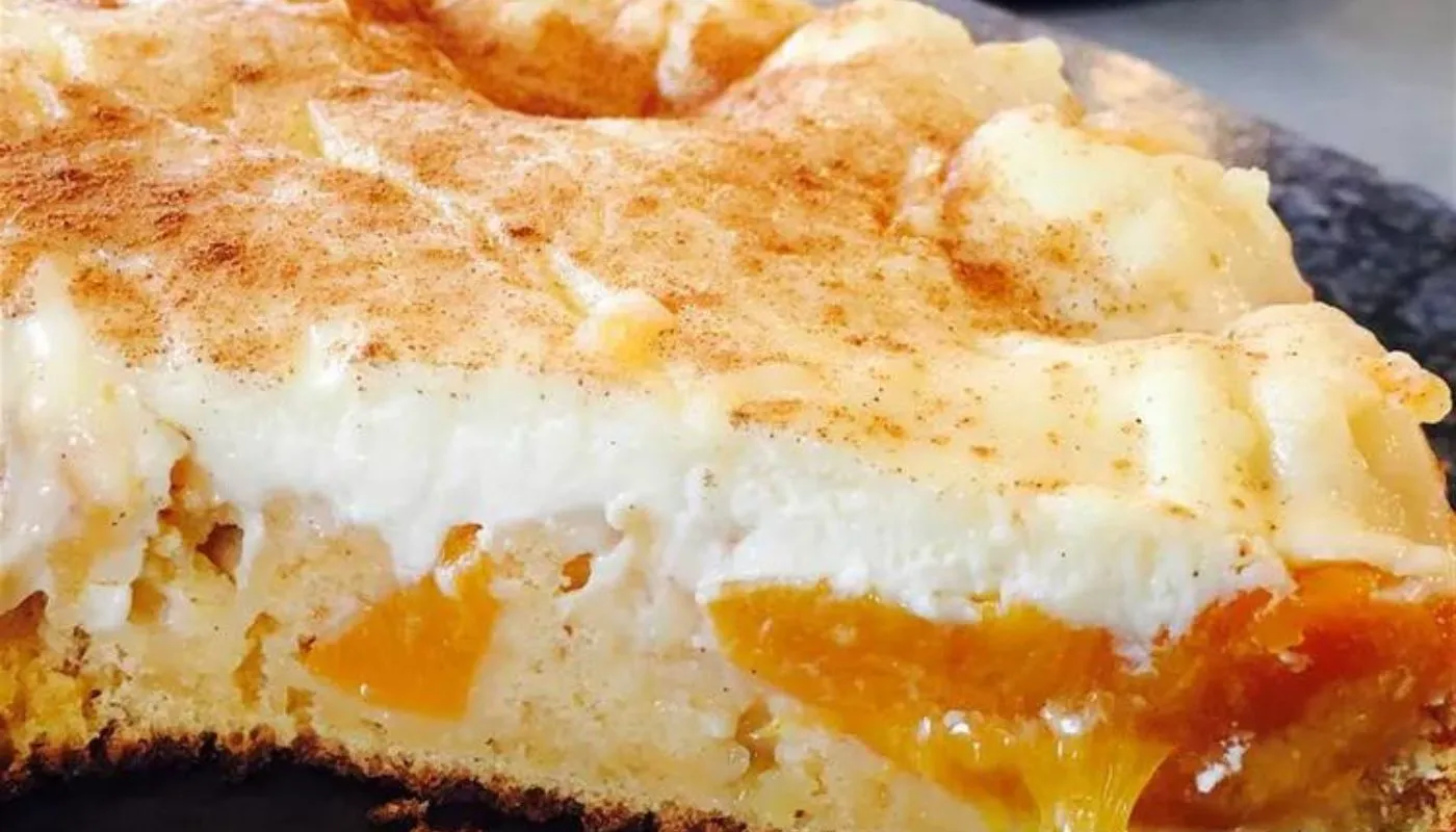 This delightful dessert combines juicy peaches with a luscious vanilla cream filling, nestled in a flaky golden crust.