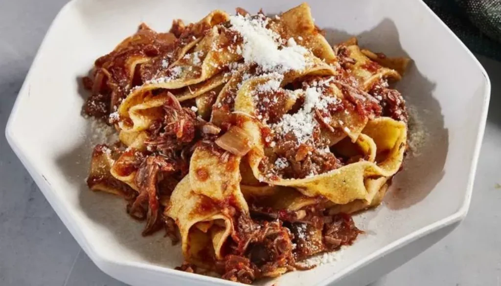 This tantalizing dish features succulent beef simmered to perfection in a rich and savory tomato-based sauce.