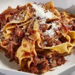 This tantalizing dish features succulent beef simmered to perfection in a rich and savory tomato-based sauce.