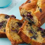 This heavenly creation combines the classic comfort of moist banana bread with a delightful burst of juicy blueberries in every bite.