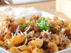 This comforting dish combines tender beef, hearty pasta, and a rich blend of savory spices, creating a mouthwatering symphony of taste and nostalgia.