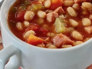 This easy-to-follow recipe guarantees a comforting blend of tender ham, hearty beans, and a medley of aromatic spices, all expertly crafted in the Instant Pot for ultimate convenience.