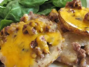 A delicious blend of hearty ground beef, tender potatoes, and a medley of savory spices, all smothered in a rich layer of melted cheese.A delicious blend of hearty ground beef, tender potatoes, and a medley of savory spices, all smothered in a rich layer of melted cheese.