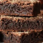 These heavenly bars feature a velvety smooth espresso-infused chocolate base, topped with a luscious layer of dark chocolate ganache.