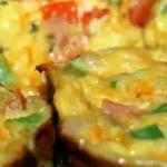 Start your day with our mouthwatering Breakfast Muffin Frittatas. These delightful handheld treats are made with a fluffy egg base and packed with your favorite breakfast ingredients. Baked in a muffin tin for easy portion control, these frittatas are perfect for a quick and wholesome breakfast on the go. With endless customization options, you can personalize each muffin with veggies, cheese, and meats of your choice. Whip up a batch in advance and enjoy warm or cold throughout the week. These savory and satisfying breakfast muffin frittatas are a delicious and convenient way to fuel your morning.