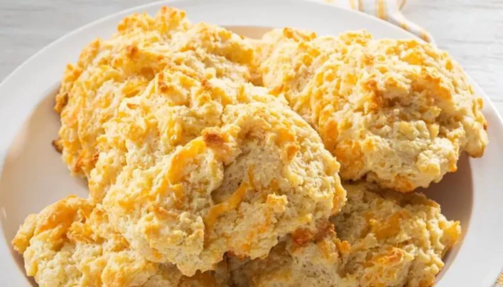 This easy-to-follow recipe will guide you through creating fluffy and buttery biscuits with a perfect blend of savory cheddar cheese.