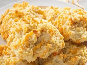 This easy-to-follow recipe will guide you through creating fluffy and buttery biscuits with a perfect blend of savory cheddar cheese.