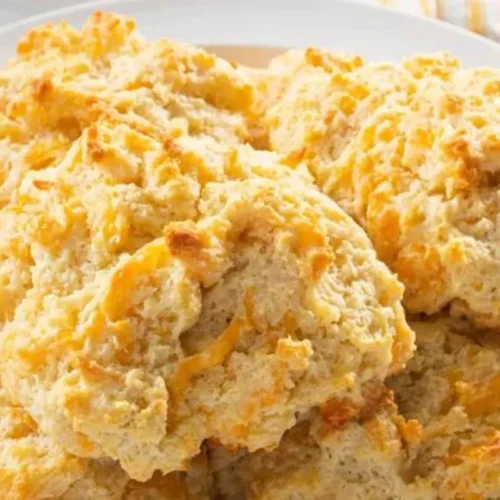 This easy-to-follow recipe will guide you through creating fluffy and buttery biscuits with a perfect blend of savory cheddar cheese.
