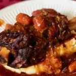 This savory recipe features succulent lamb shanks lovingly marinated in a harmonious blend of fragrant rosemary and a medley of secret spices.