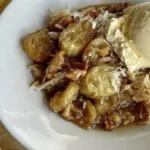 This delightful treat combines ripe bananas, aromatic cinnamon, and a hint of sweetness, creating a truly blissful experience for your taste buds.