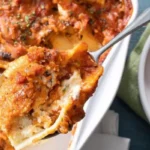 These delectable pasta shells are generously filled with a creamy blend of ricotta, mozzarella, and parmesan cheeses, then baked to golden perfection.
