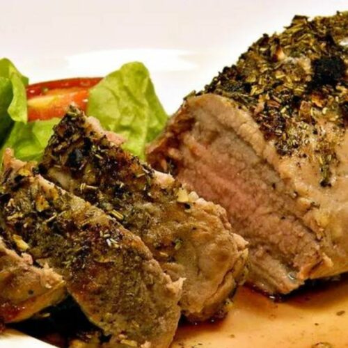 This savory dish features tender pork tenderloin infused with fragrant garlic and aromatic rosemary, creating a symphony of flavors that will delight your taste buds.