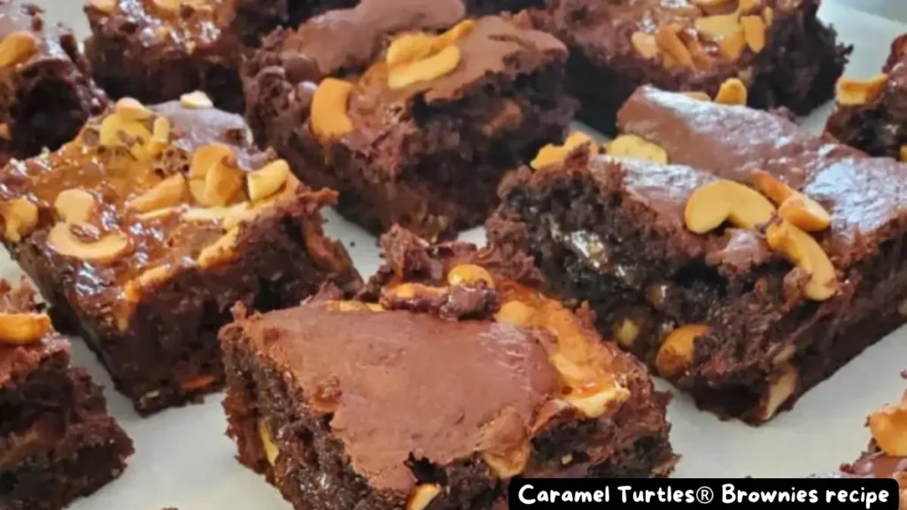 Close-up view of Caramel Turtles Brownies with a rich caramel drizzle and pecan toppings.