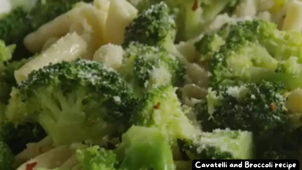 A close-up view of a delicious Cavatelli and Broccoli dish garnished with Parmesan cheese