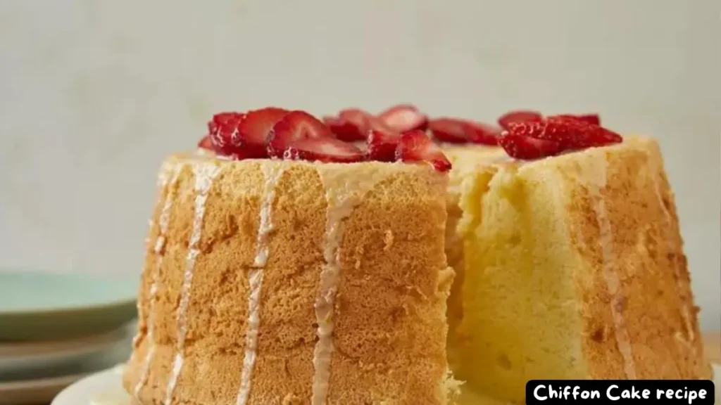 A beautifully baked chiffon cake topped with sliced strawberries