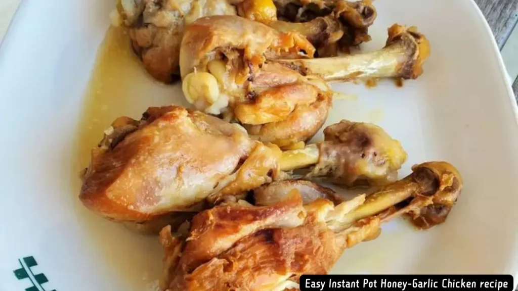 Plate of succulent honey-garlic chicken drumsticks cooked in an Instant Pot.