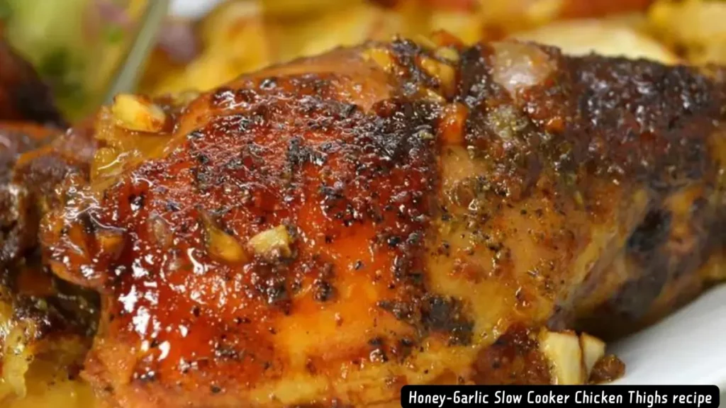 Close-up of Honey-Garlic Slow Cooker Chicken Thighs, showing the juicy, caramelized exterior