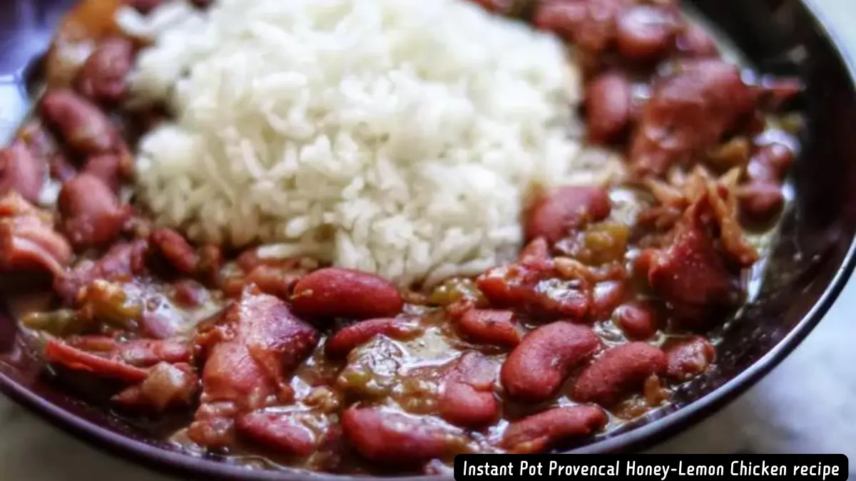 A plate of Instant Pot NOLA Red Beans and Rice served with a mound of white rice.