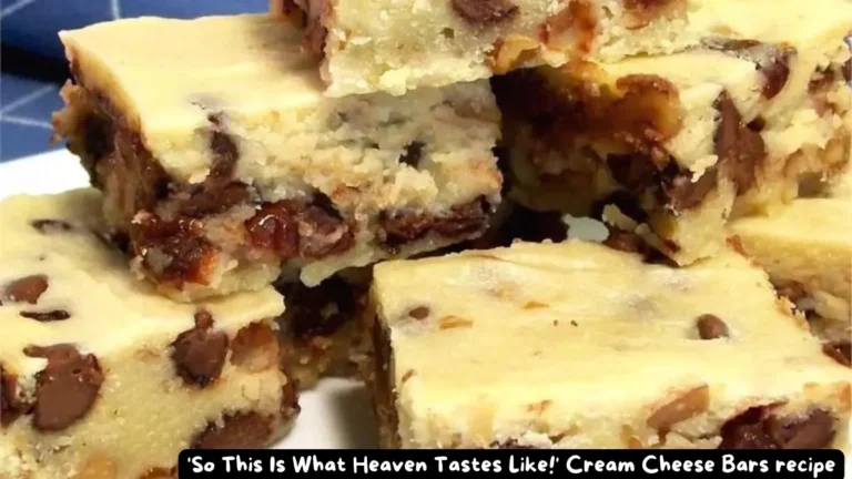Close-up of rich and creamy cream cheese bars with chocolate chips and walnuts, displayed on a white plate.