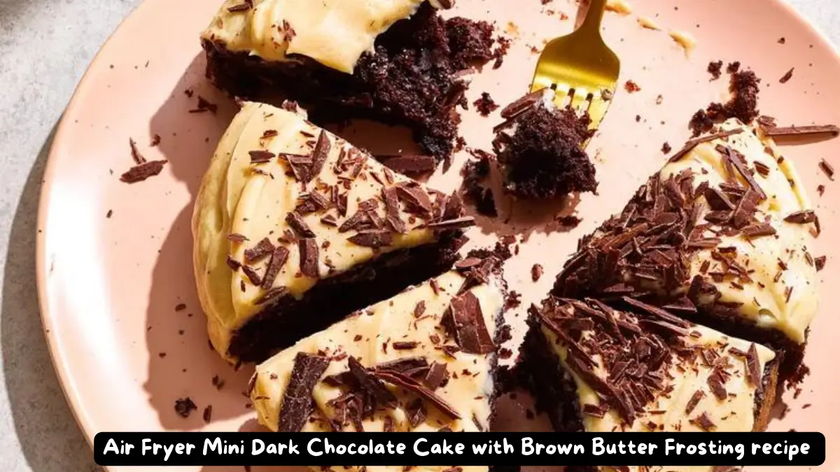 Slices of air fryer mini dark chocolate cake topped with brown butter frosting, arranged on a pink plate with a fork taking a bite.