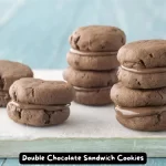 Double Chocolate Sandwich Cookies with chocolate hazelnut filling on a white plate.