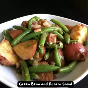 A bowl of Green Bean and Potato Salad with fresh ingredients